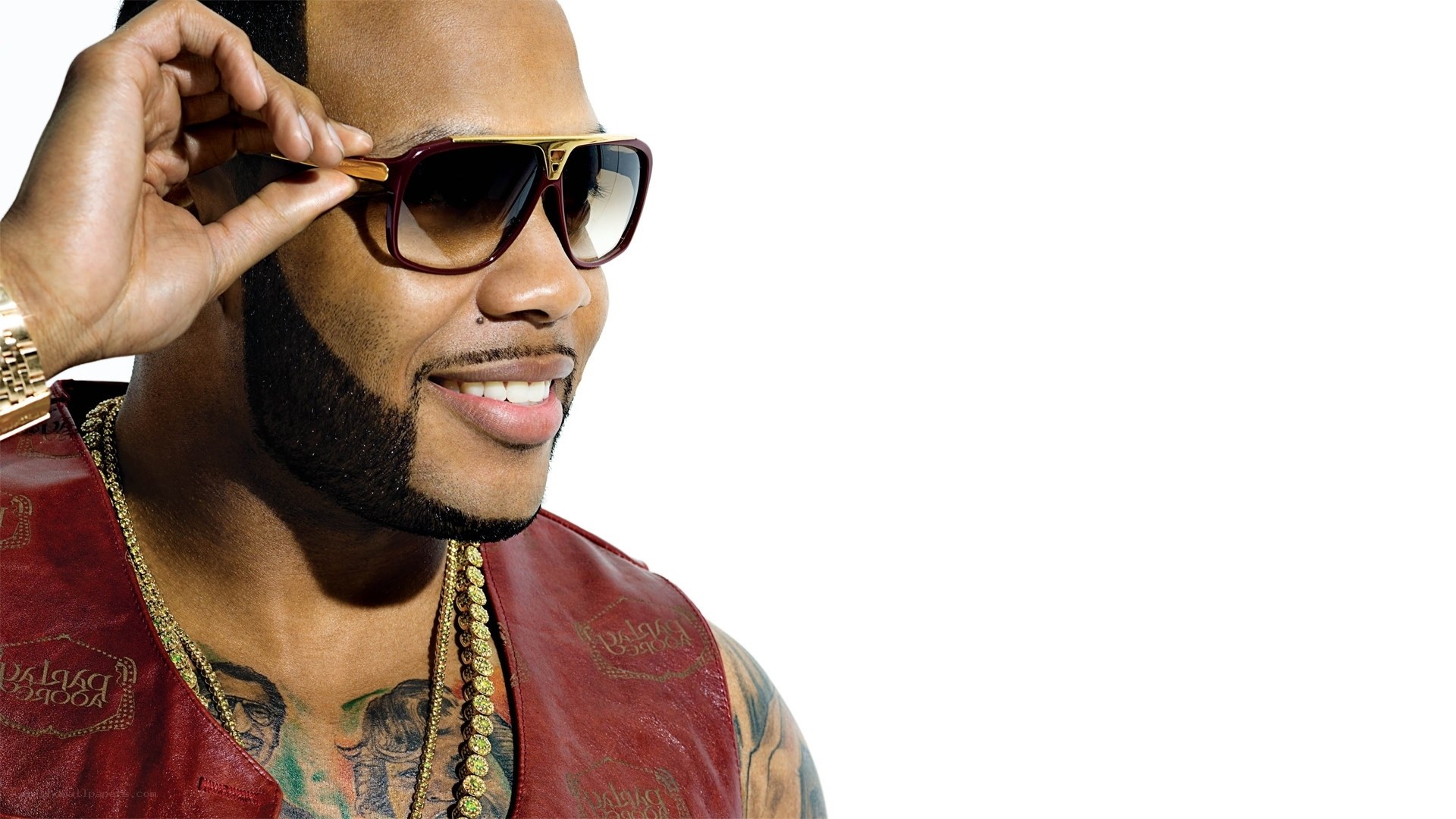 man in sunglasses and vest