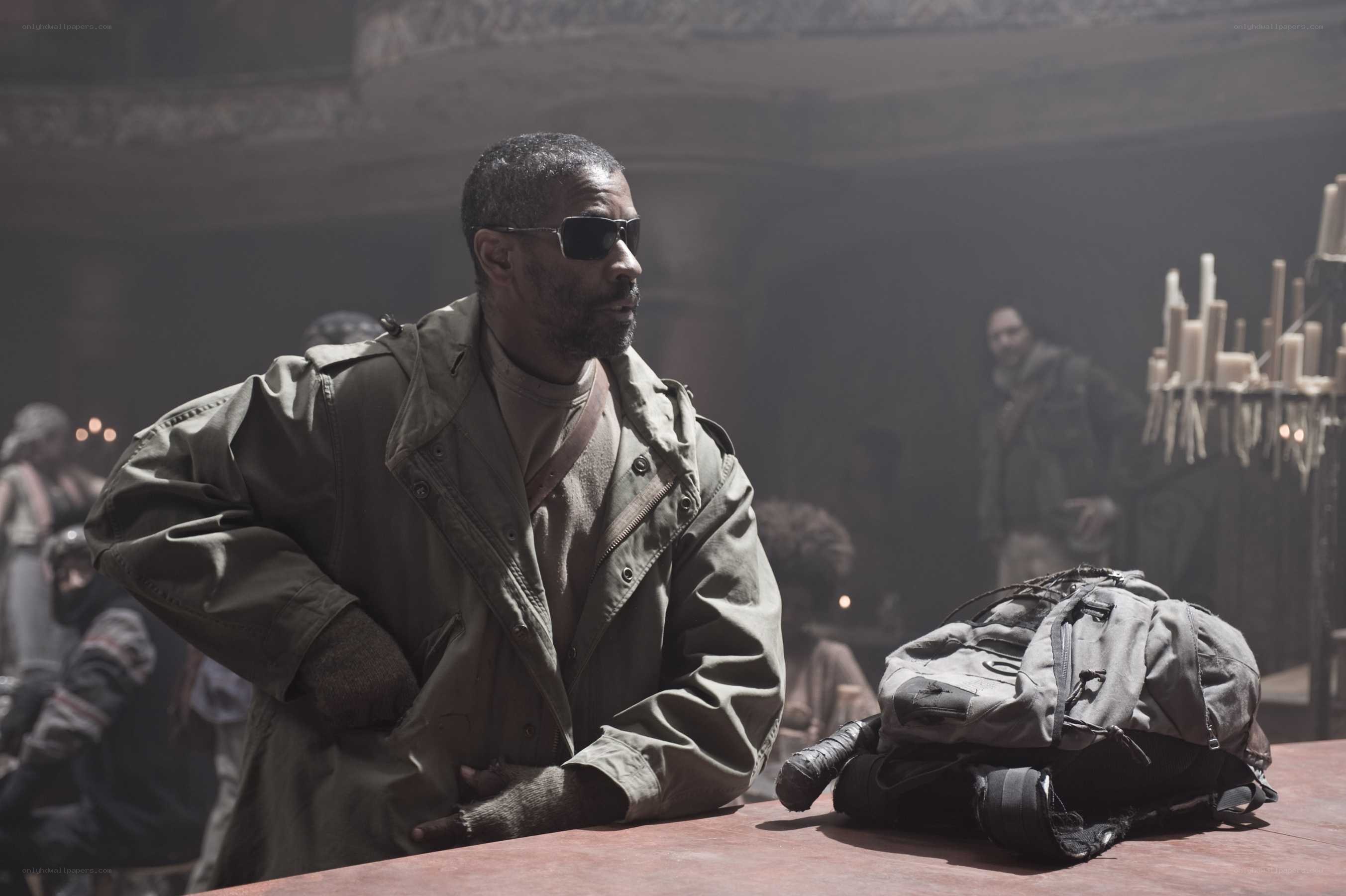 Man in sunglasses at a table