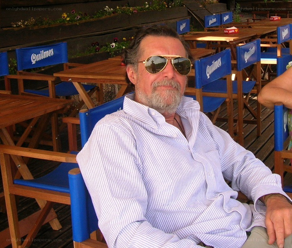 Man in sunglasses at outdoor cafe