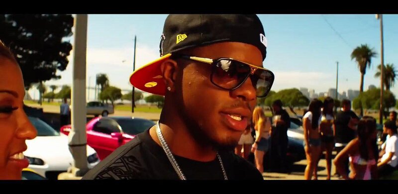 Man in sunglasses at outdoor gathering