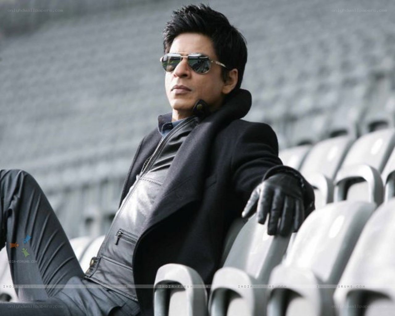 man in sunglasses at stadium