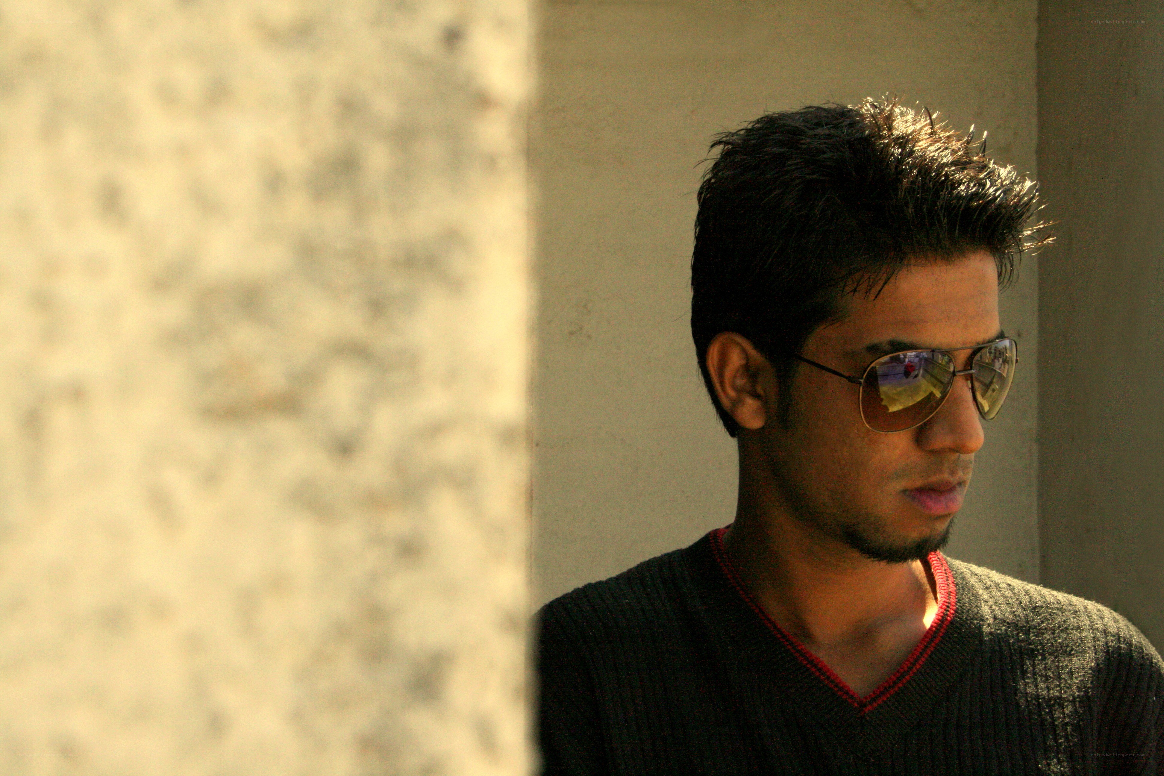 man in sunglasses looking away