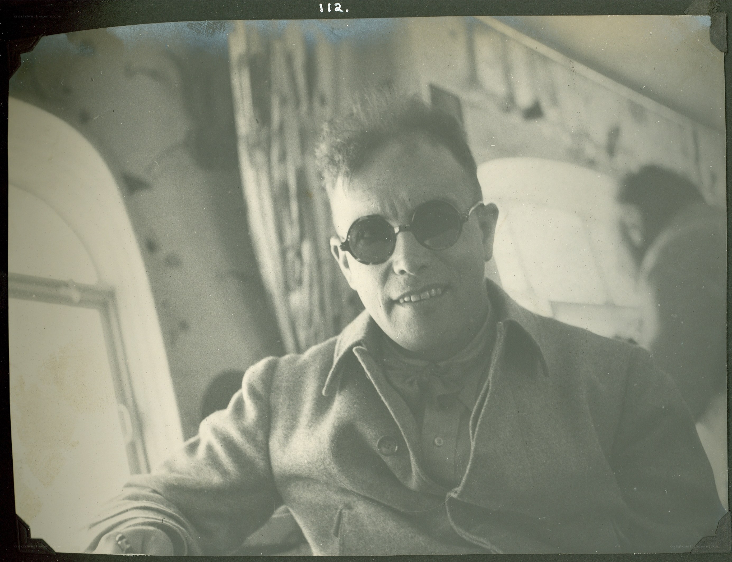 Man in sunglasses on a ship