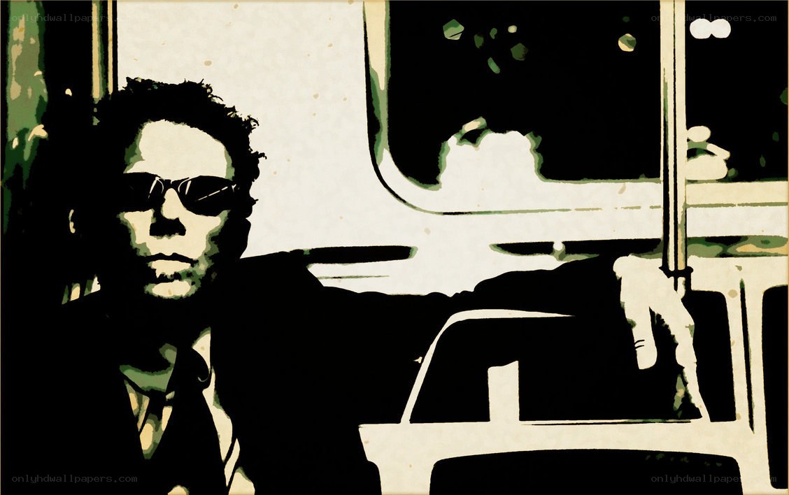 man in sunglasses on bus