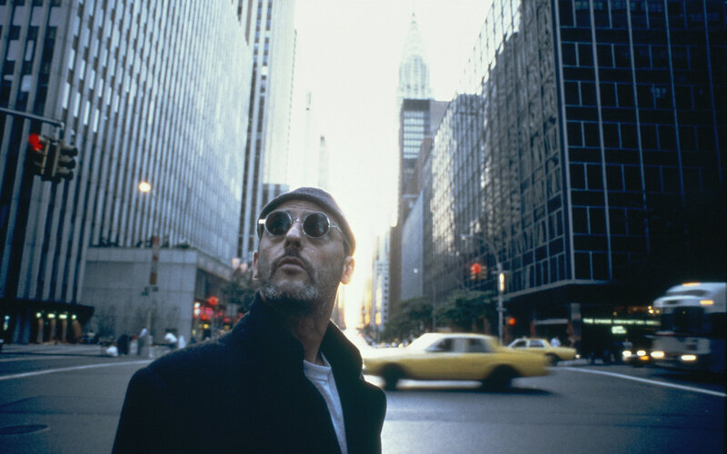 Man in sunglasses on city street