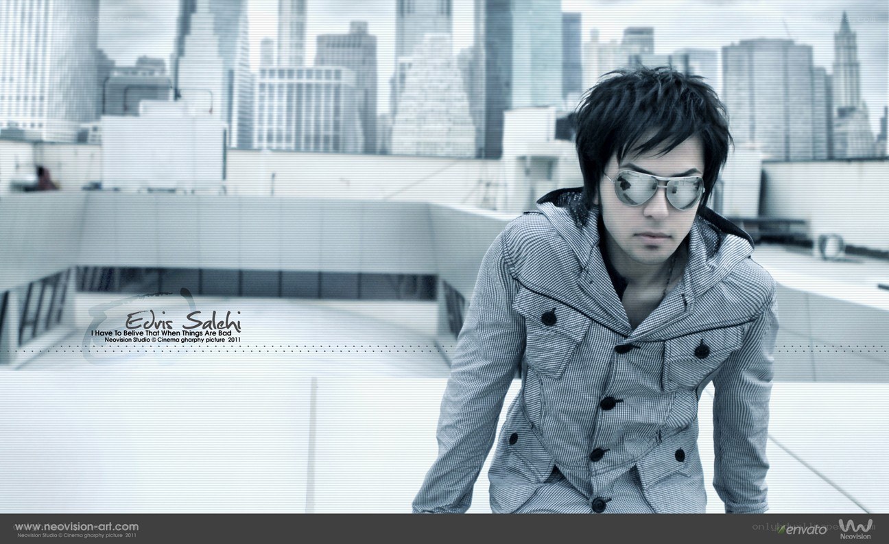 Man in sunglasses on rooftop