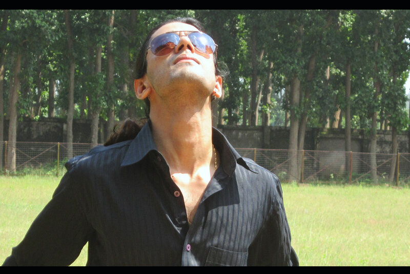 Man in Sunglasses Outdoors — Green