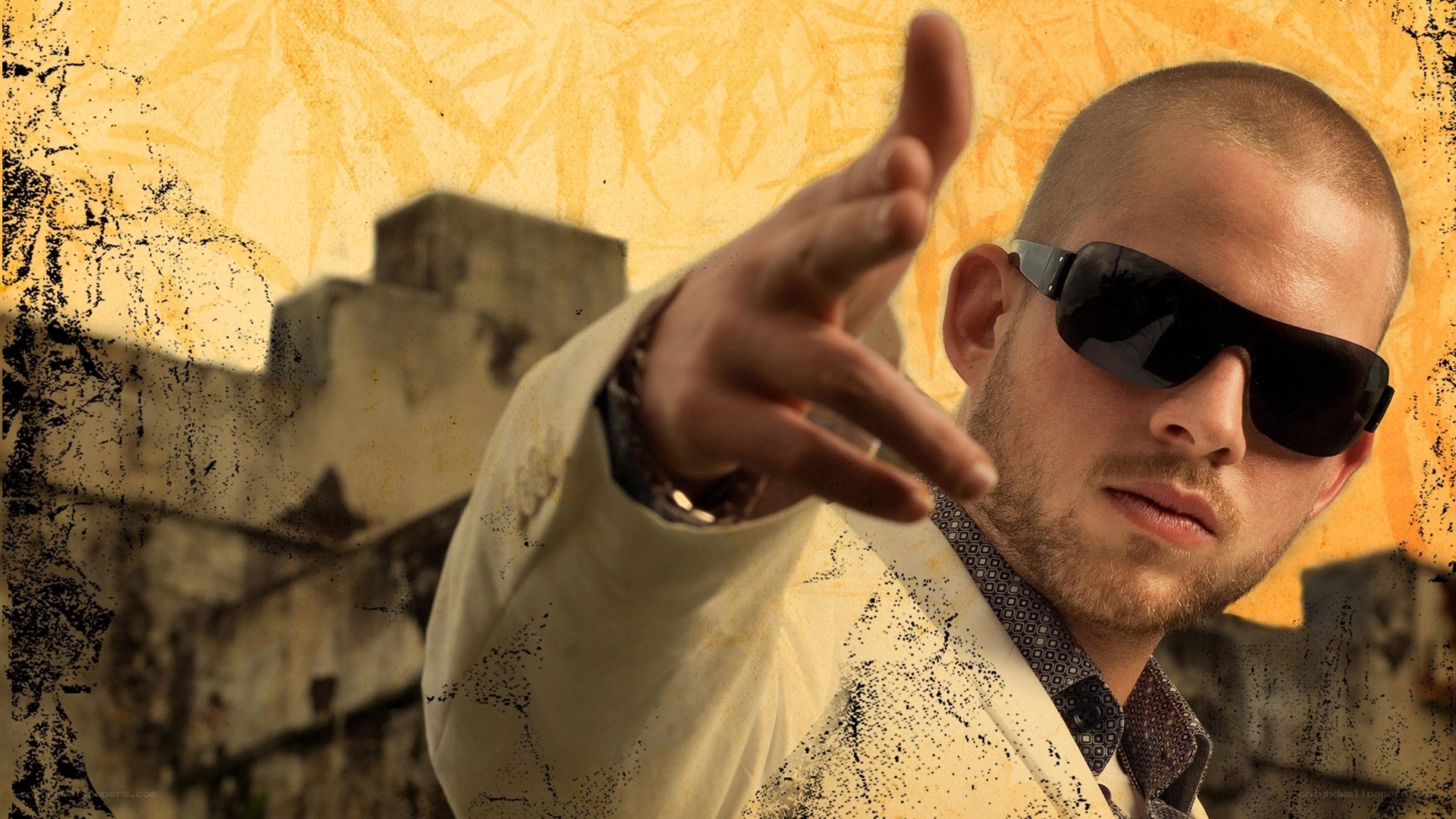 man in sunglasses pointing
