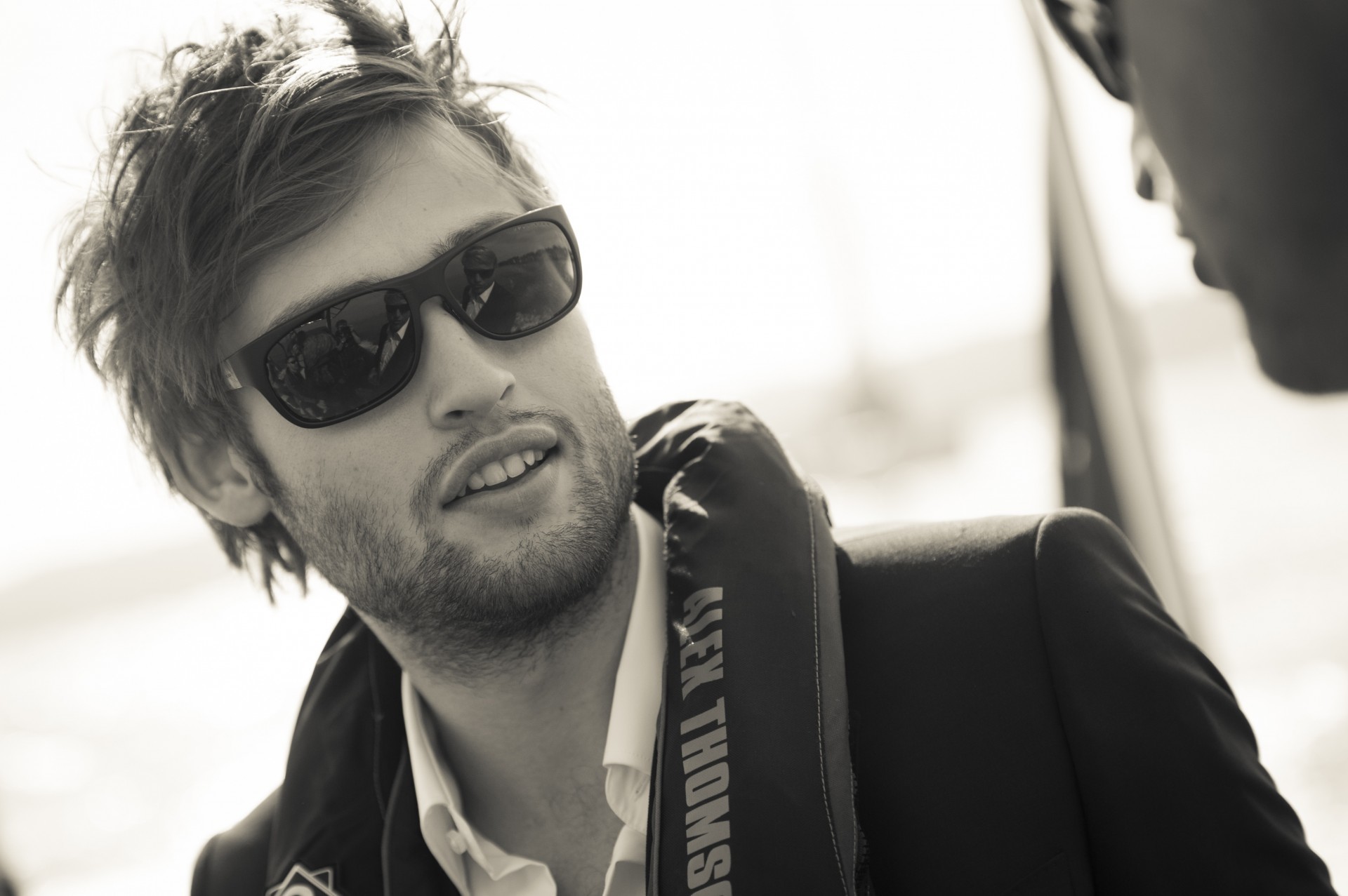 man in sunglasses smiling