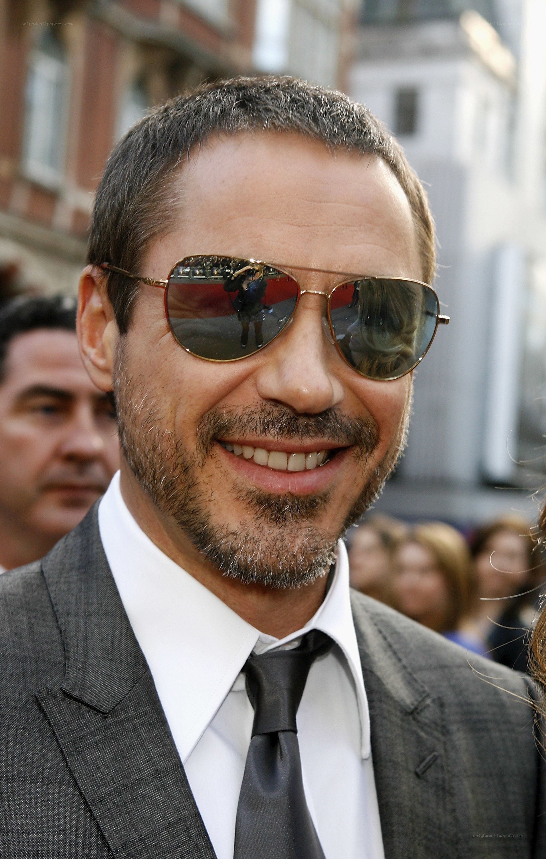 man in sunglasses smiling