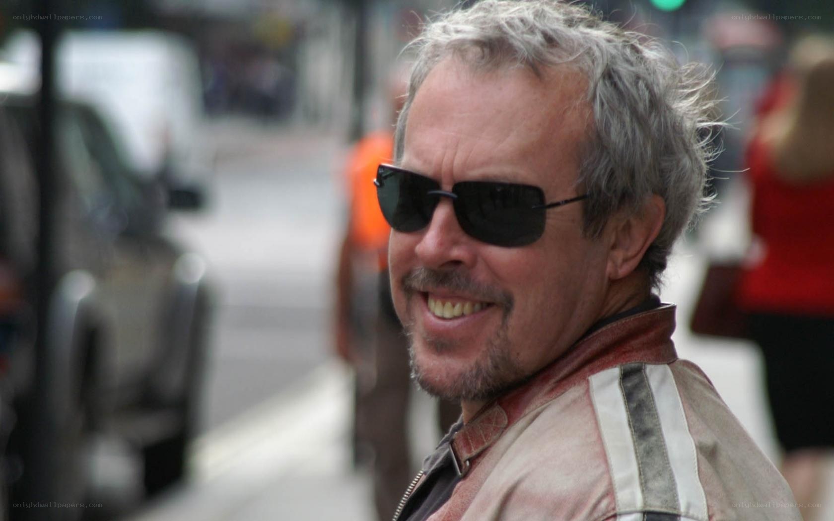 man in sunglasses smiling
