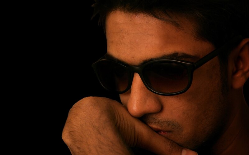 man in sunglasses thinking