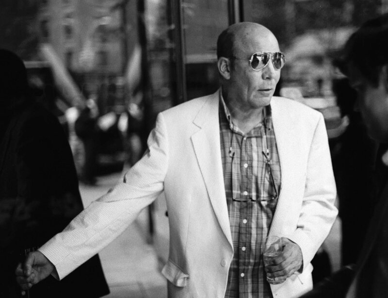 Man in sunglasses walking