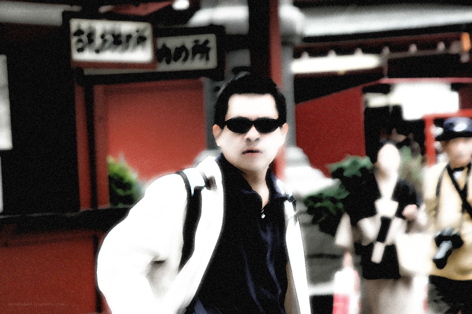 man in sunglasses walking