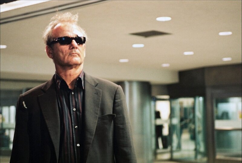 man in sunglasses walking