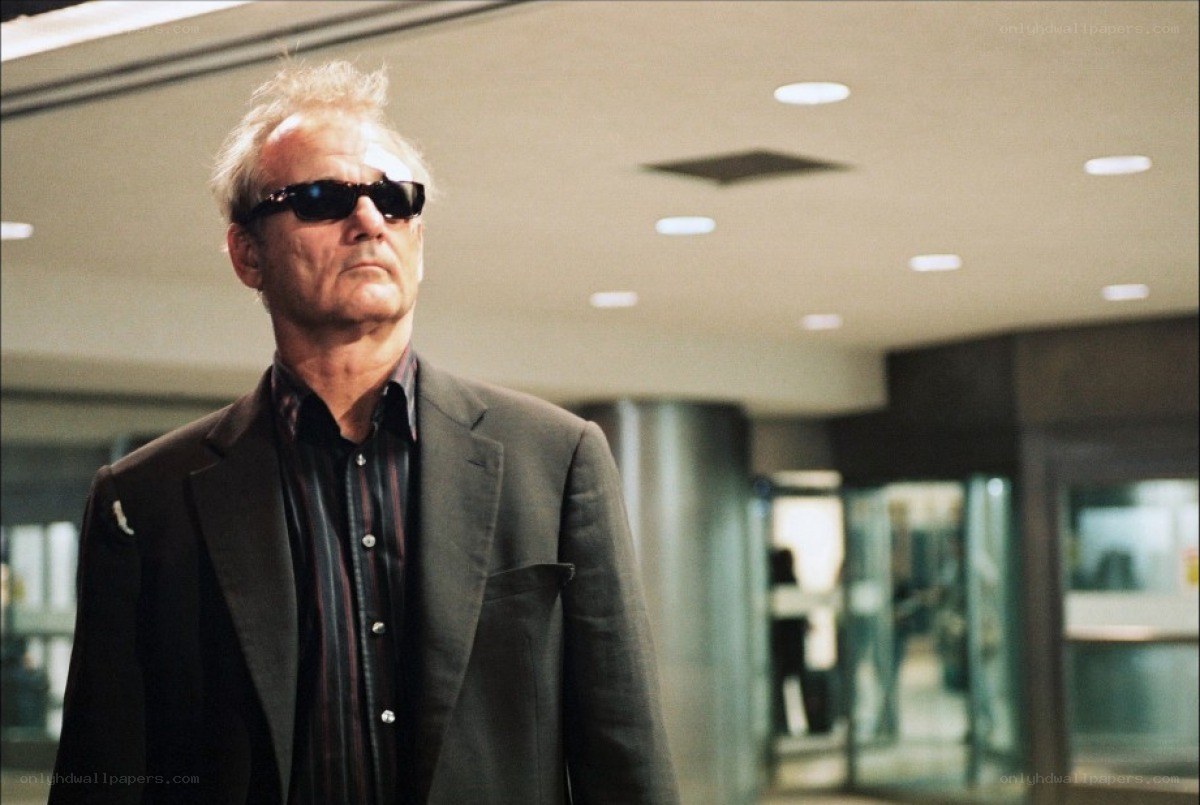 man in sunglasses walking