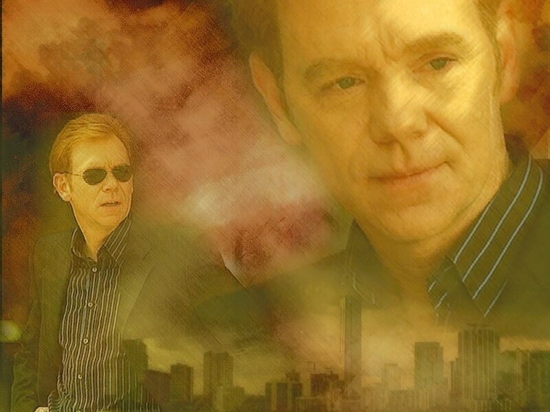 man in sunglasses with city backdrop