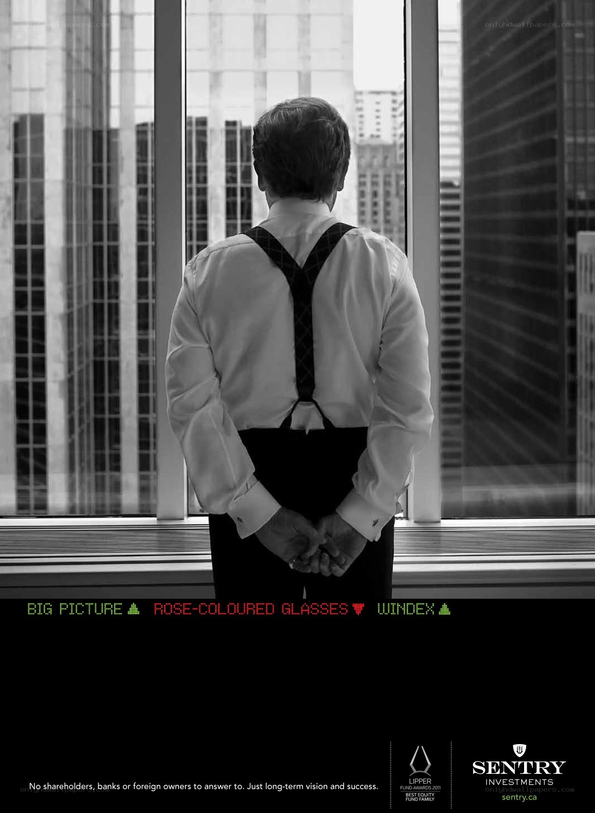 Man in suspenders at window