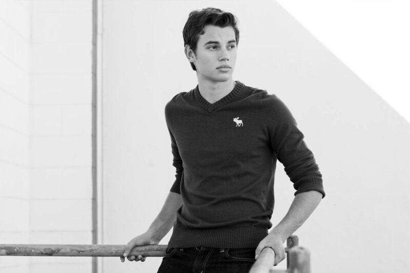 man in sweater standing