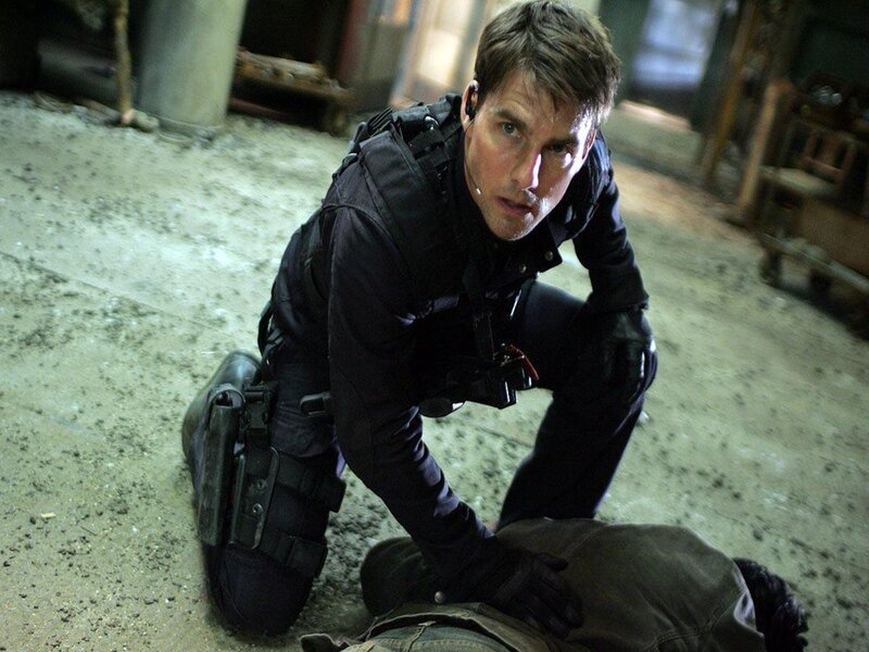 man in tactical gear kneeling