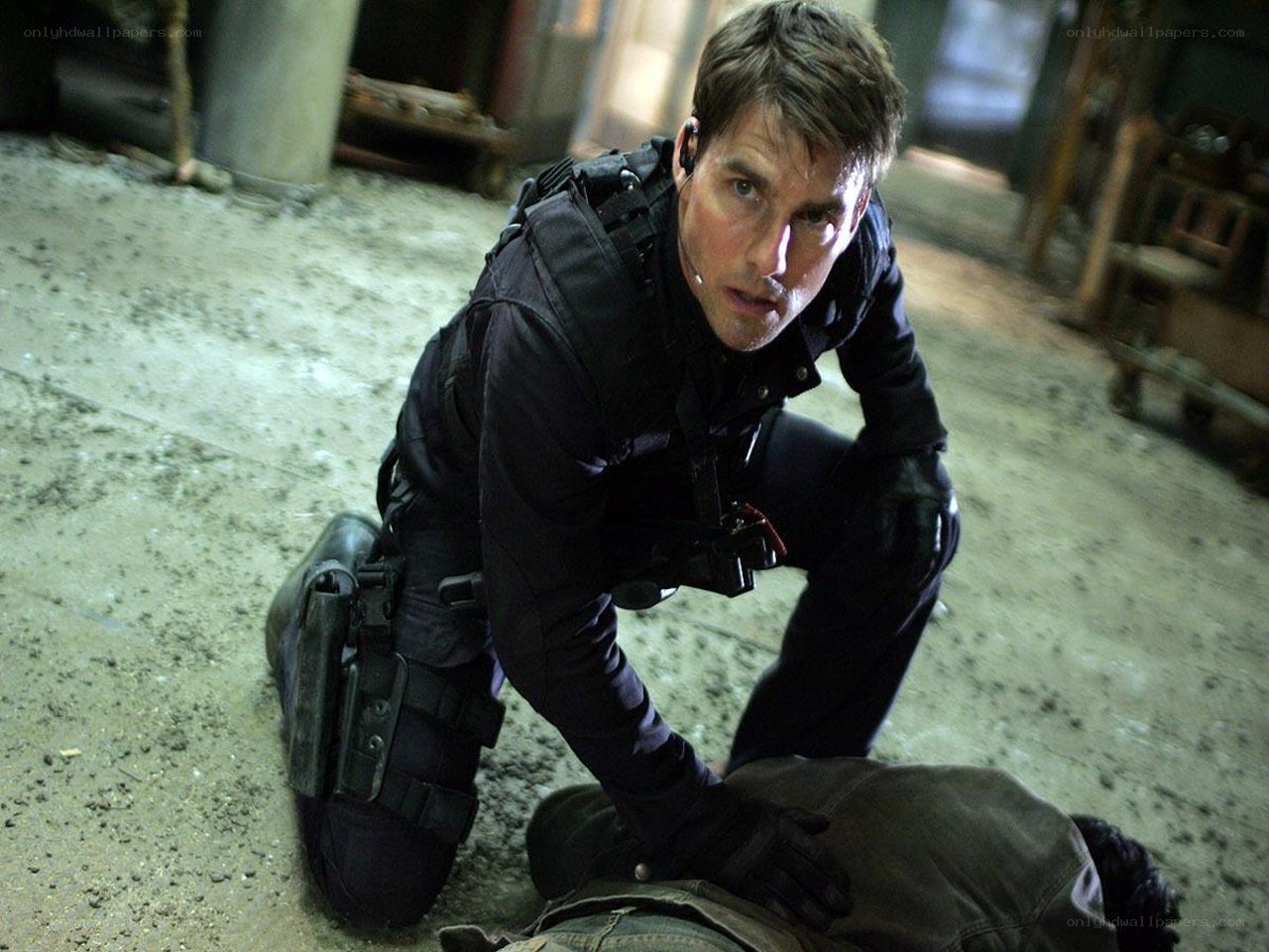man in tactical gear kneeling