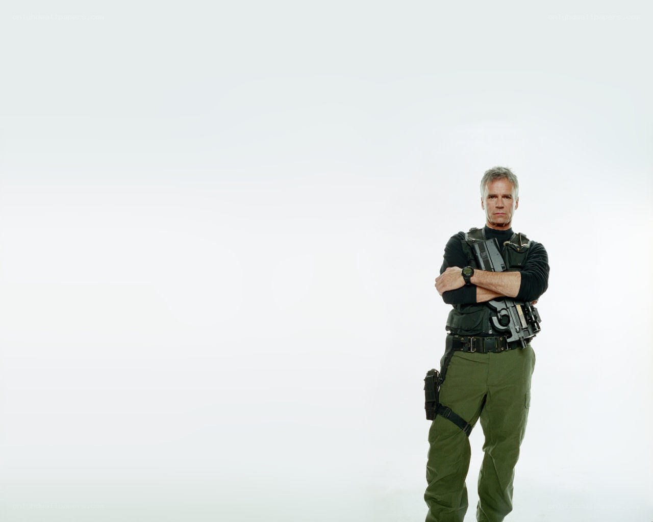 man in tactical gear with weapon