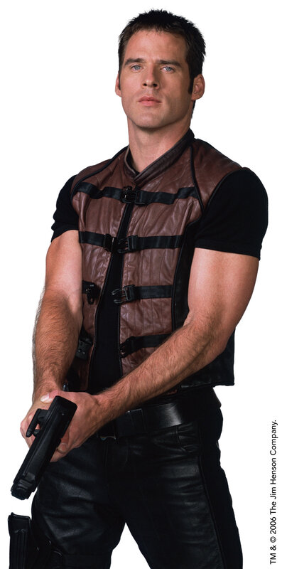 man in tactical vest holding gun