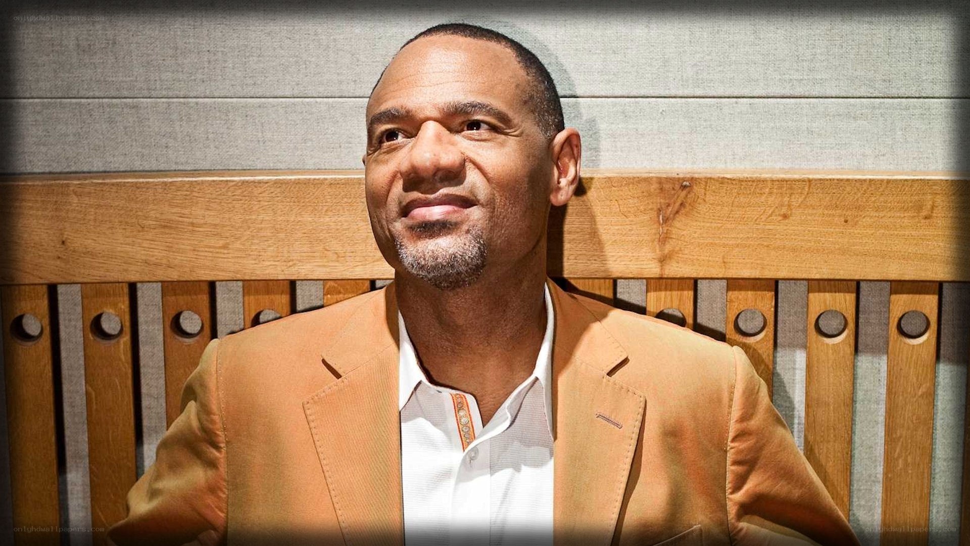 man in tan blazer