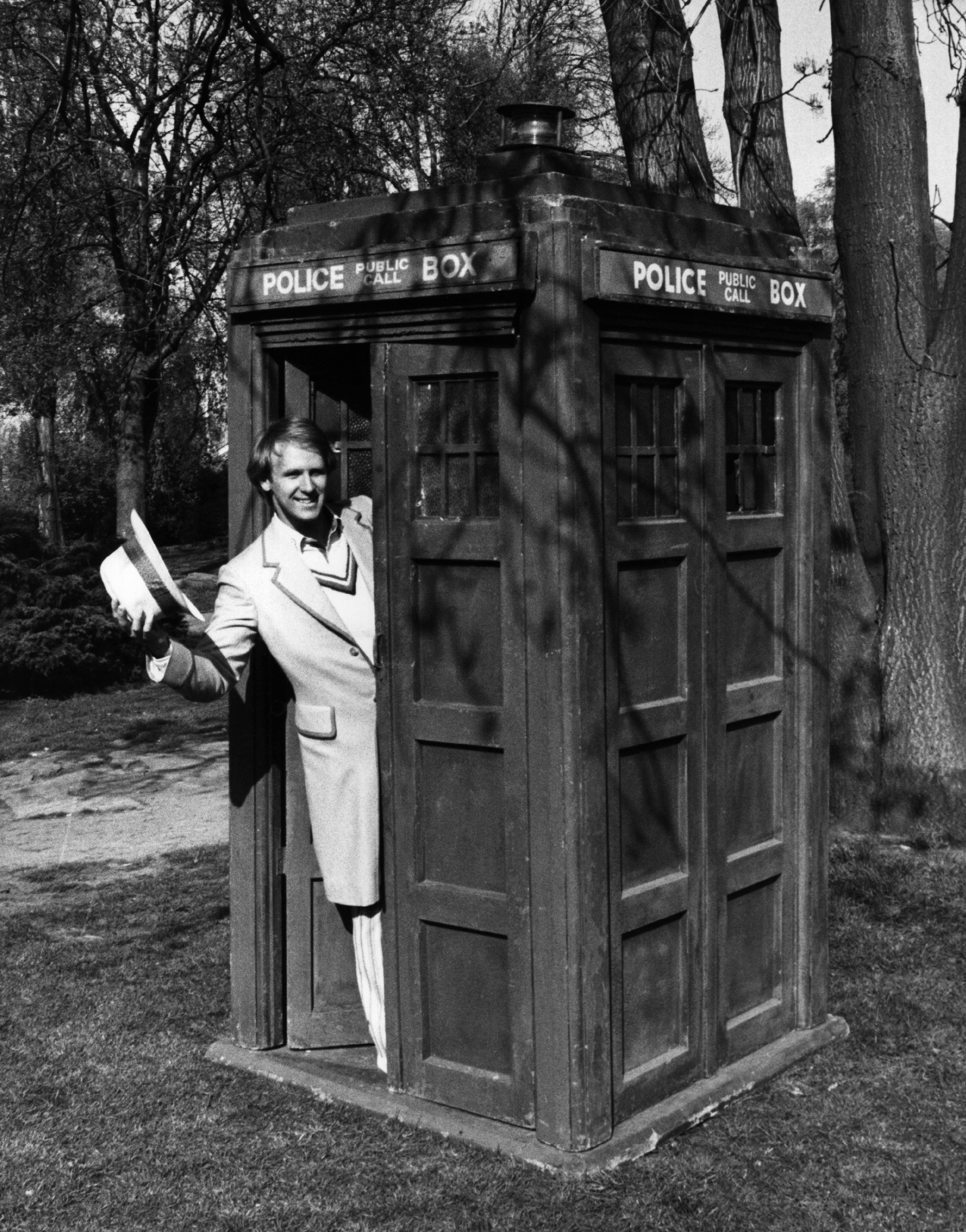 Man in TARDIS phone booth