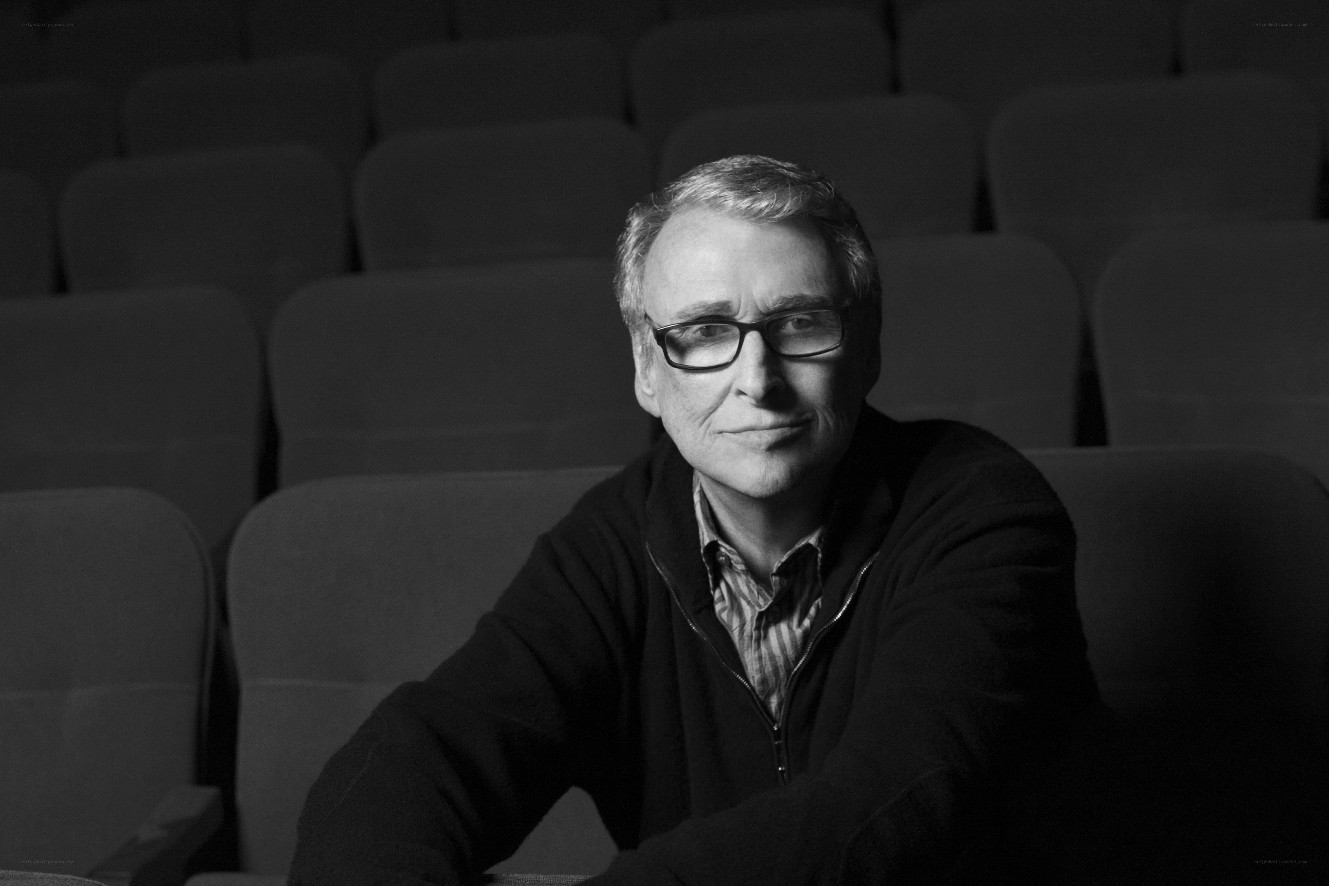 Man in theater seat