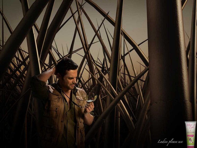 man in thorny maze with compass