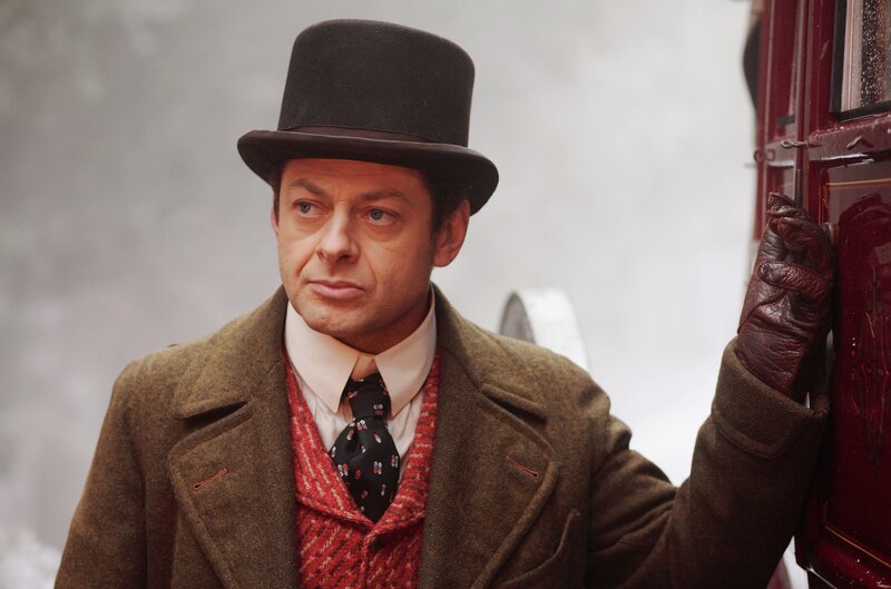 man in top hat and coat