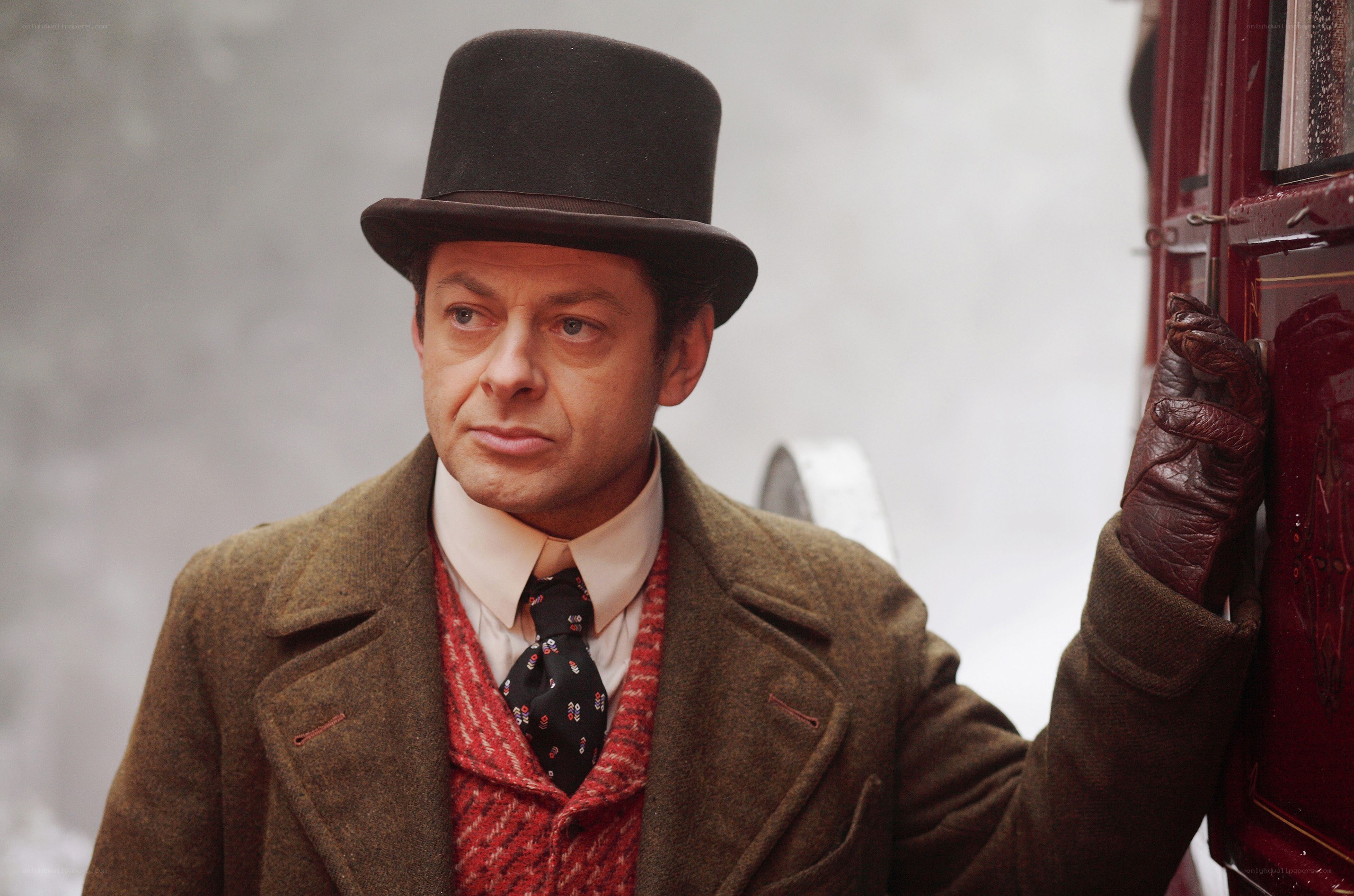 man in top hat and coat
