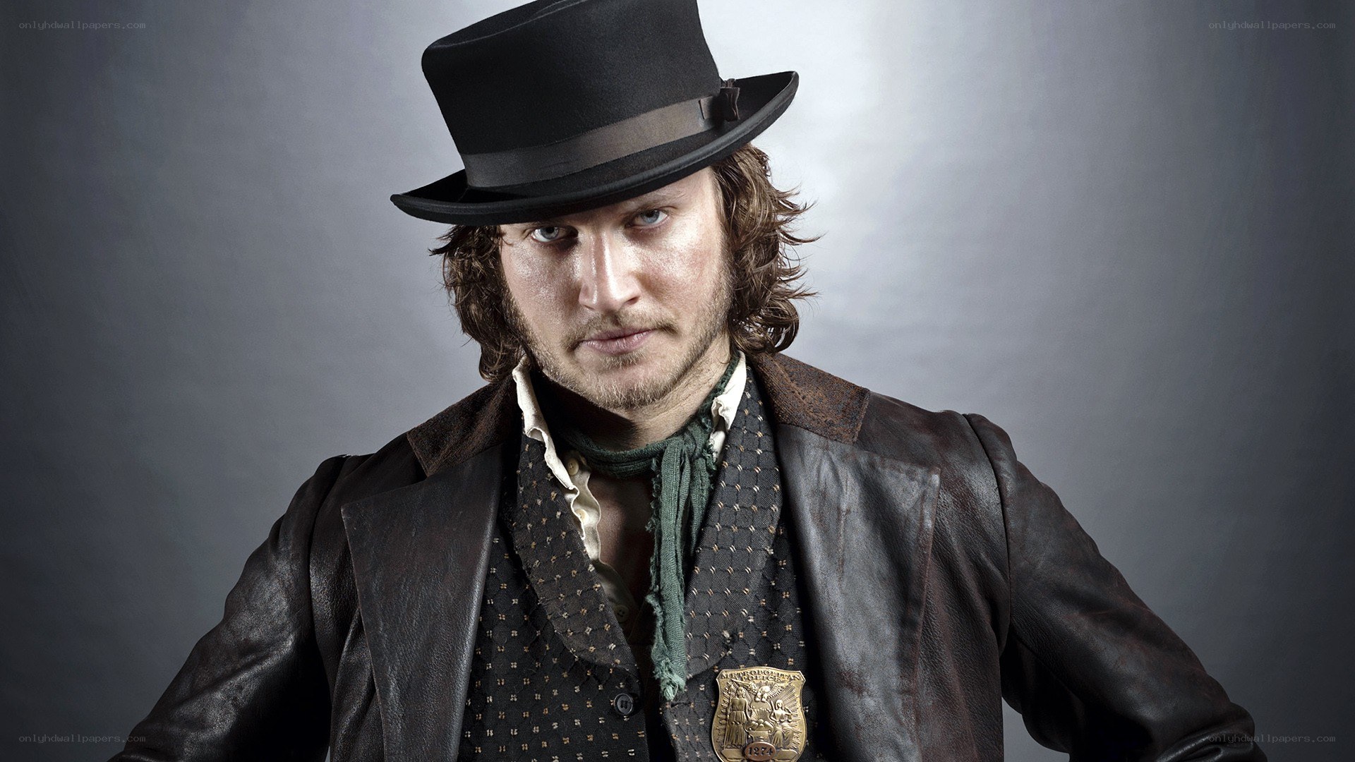 man in top hat and leather coat