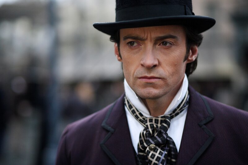 man in top hat and suit