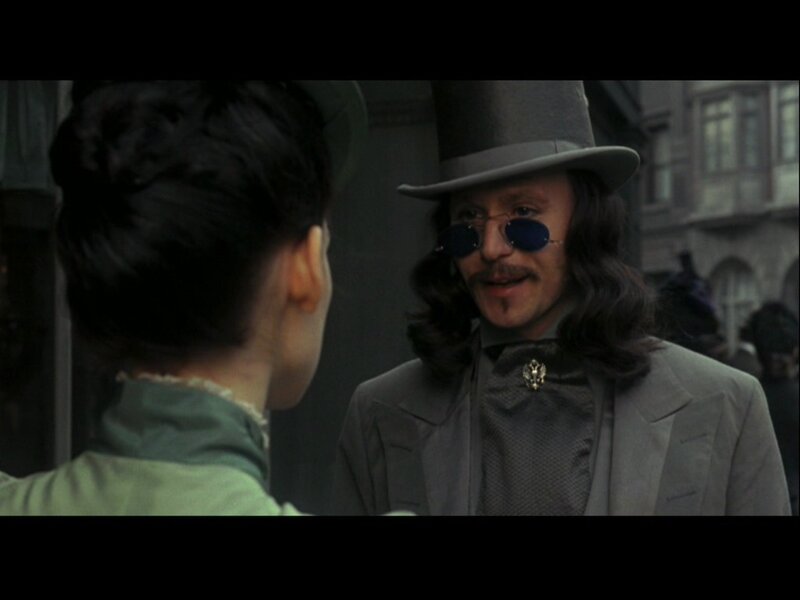 Man in Top Hat and Sunglasses