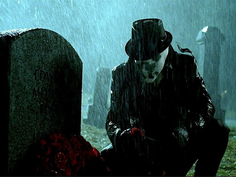 Man in Top Hat at Grave