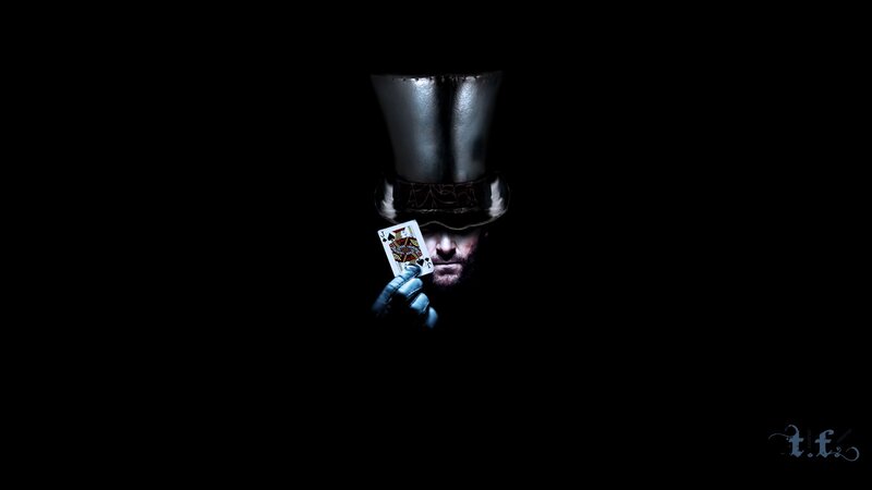 Man in Top Hat Holding Card — Black