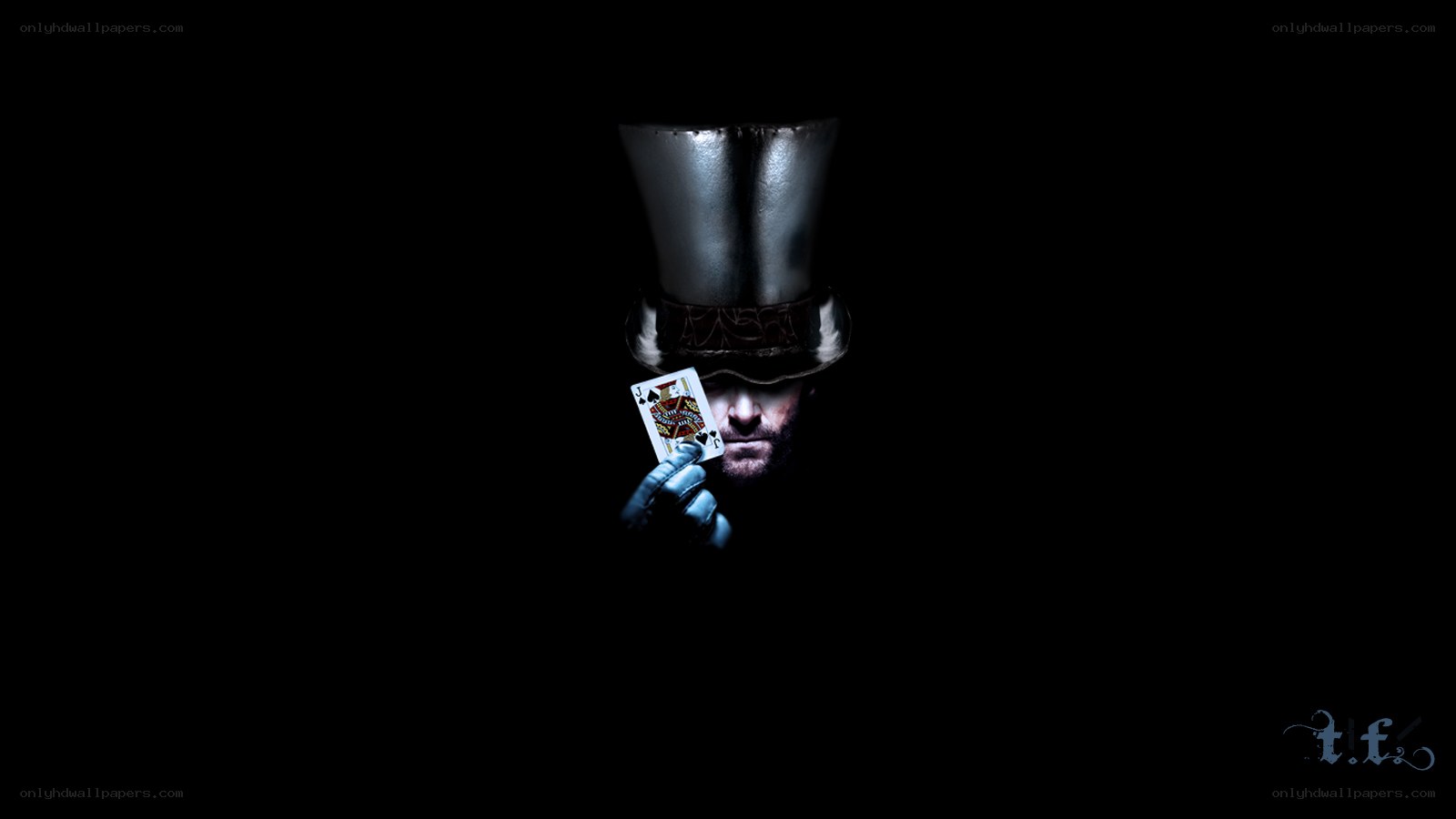 man in top hat holding card