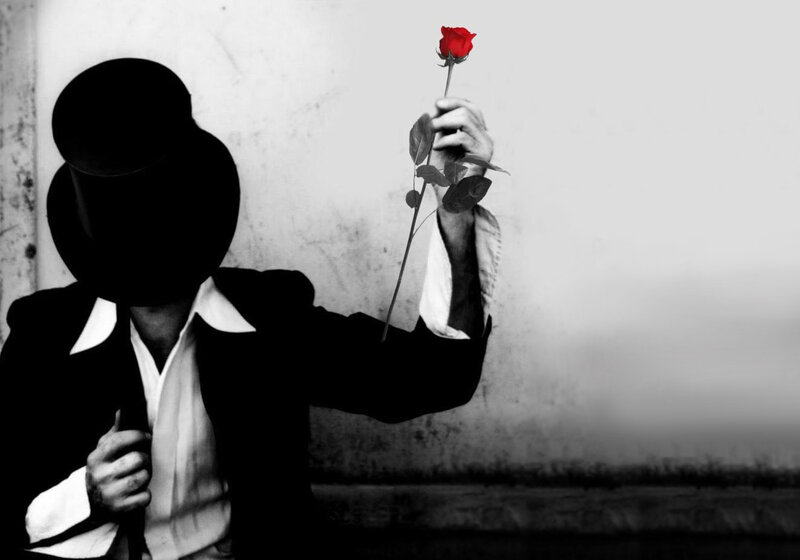 Man in Top Hat Holding Rose