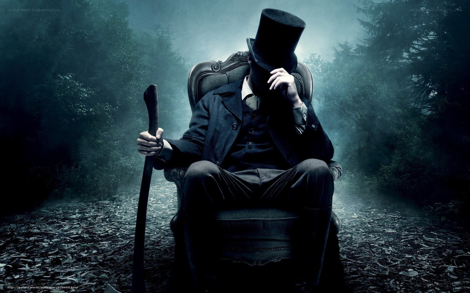 Man in top hat in misty forest