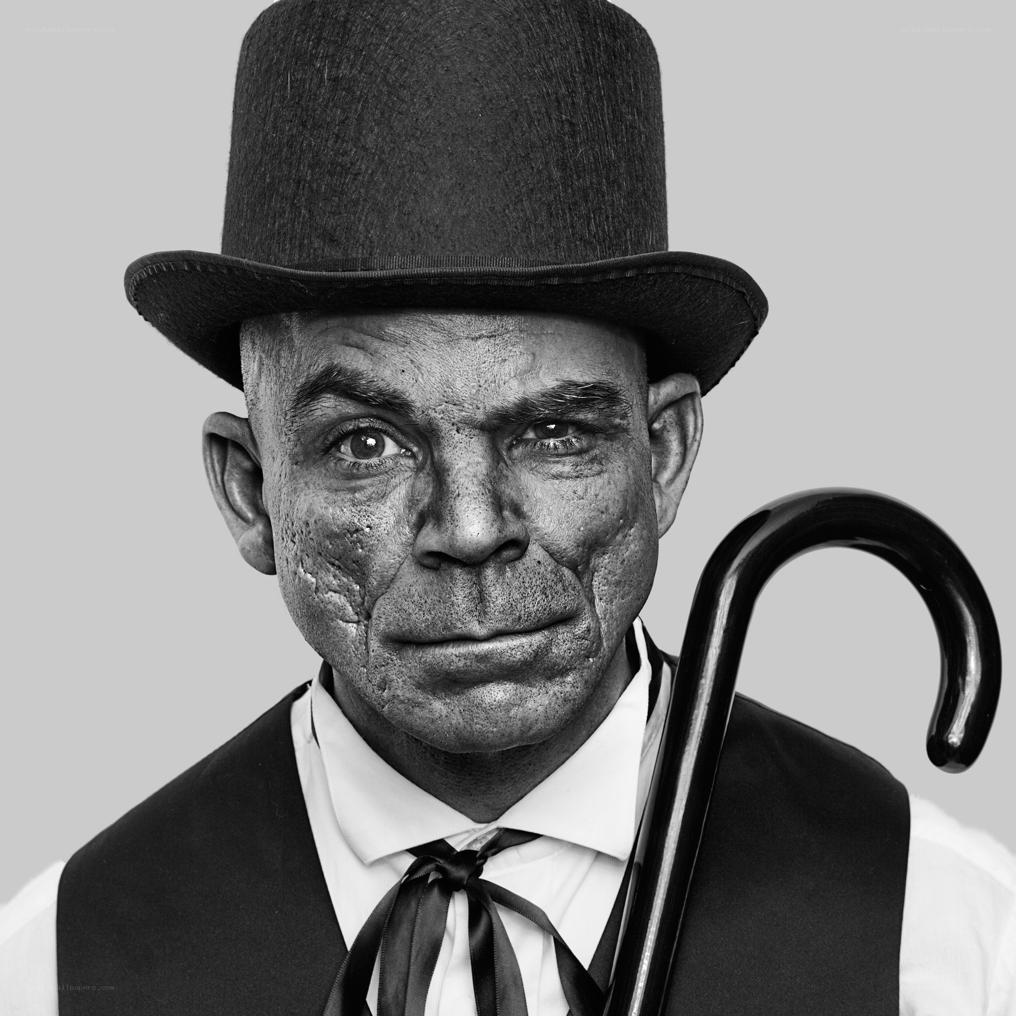 man in top hat with cane