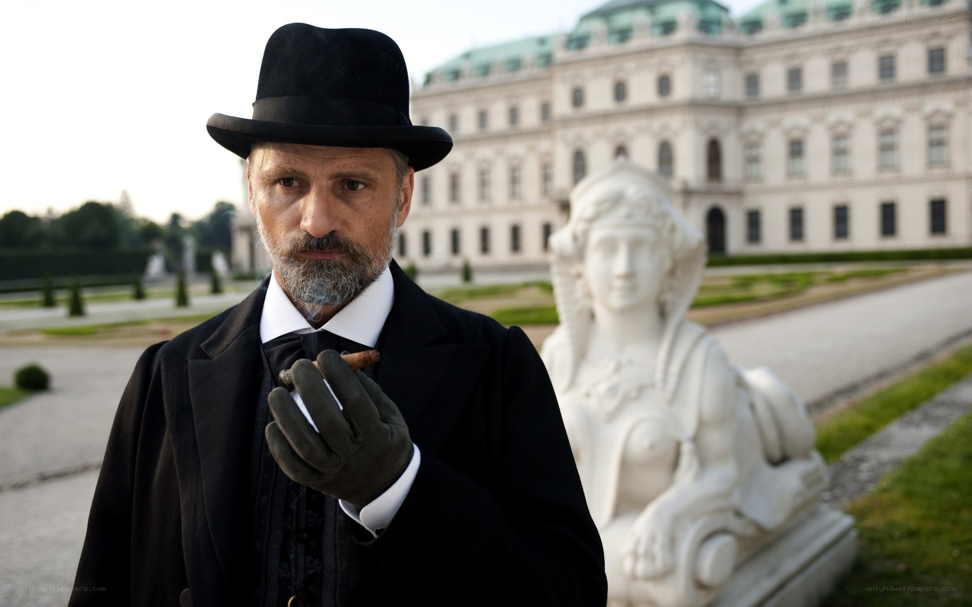 Man in top hat with cigar