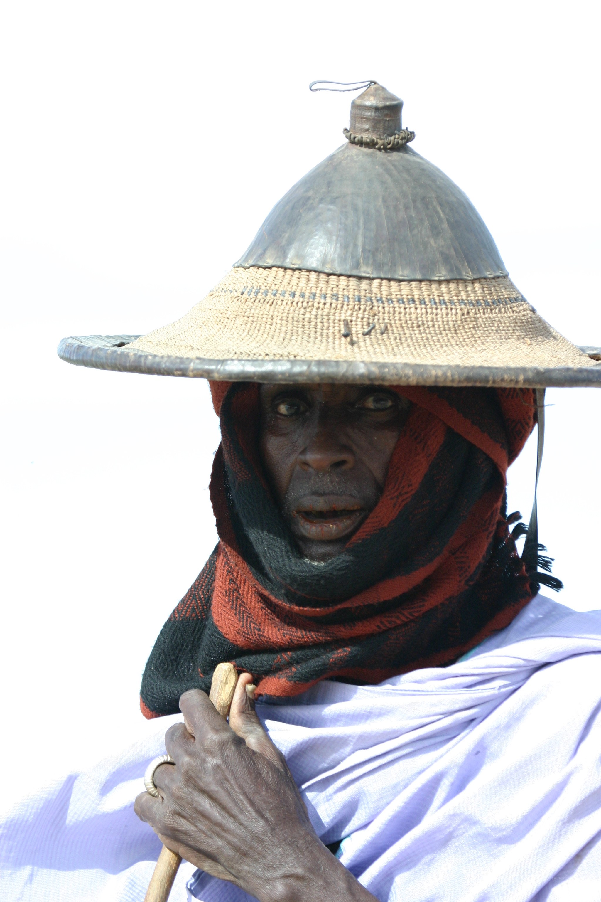 Man in traditional hat and scarf