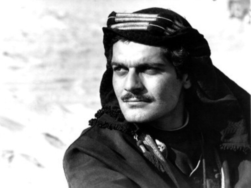 Man in Traditional Headwear — Black, Serious