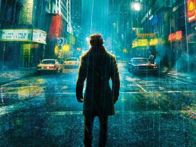 man in trench coat on rainy street