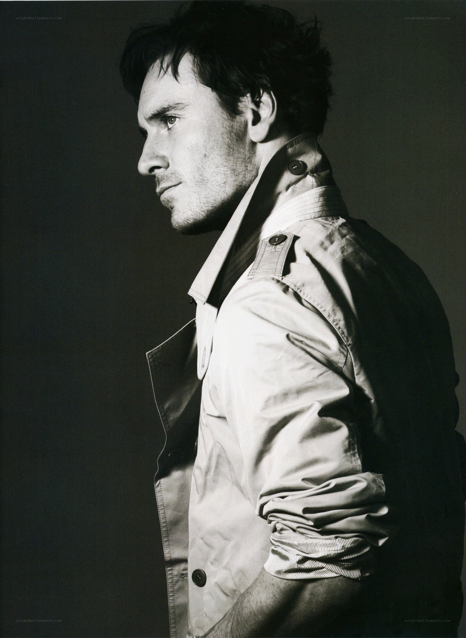 man in trench coat profile