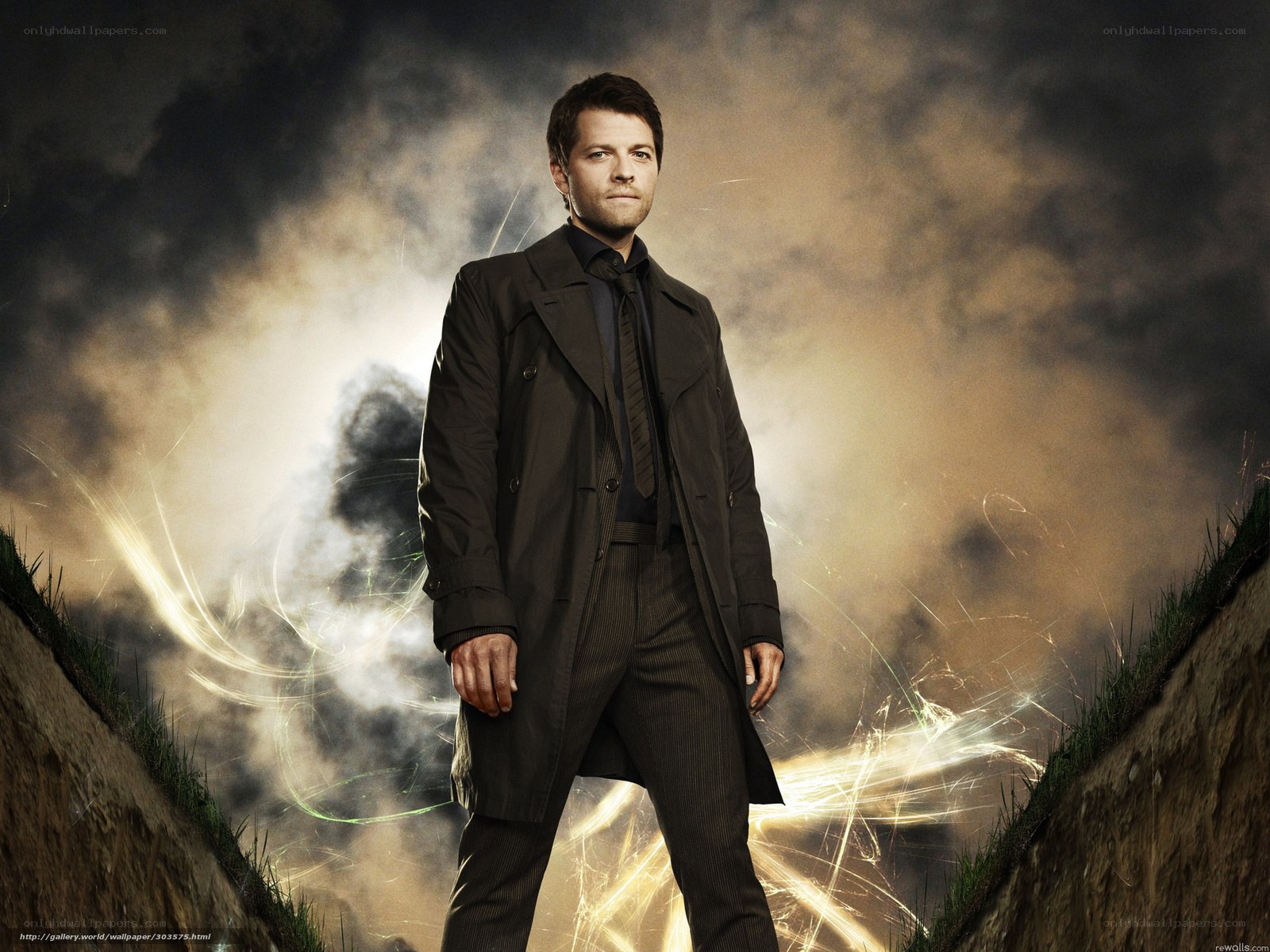 man in trench coat standing