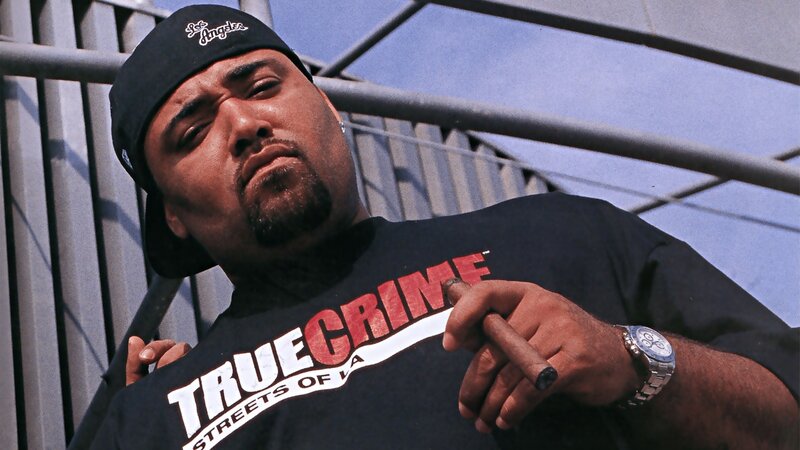 man in true crime t-shirt