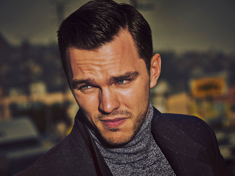 man in turtleneck and coat